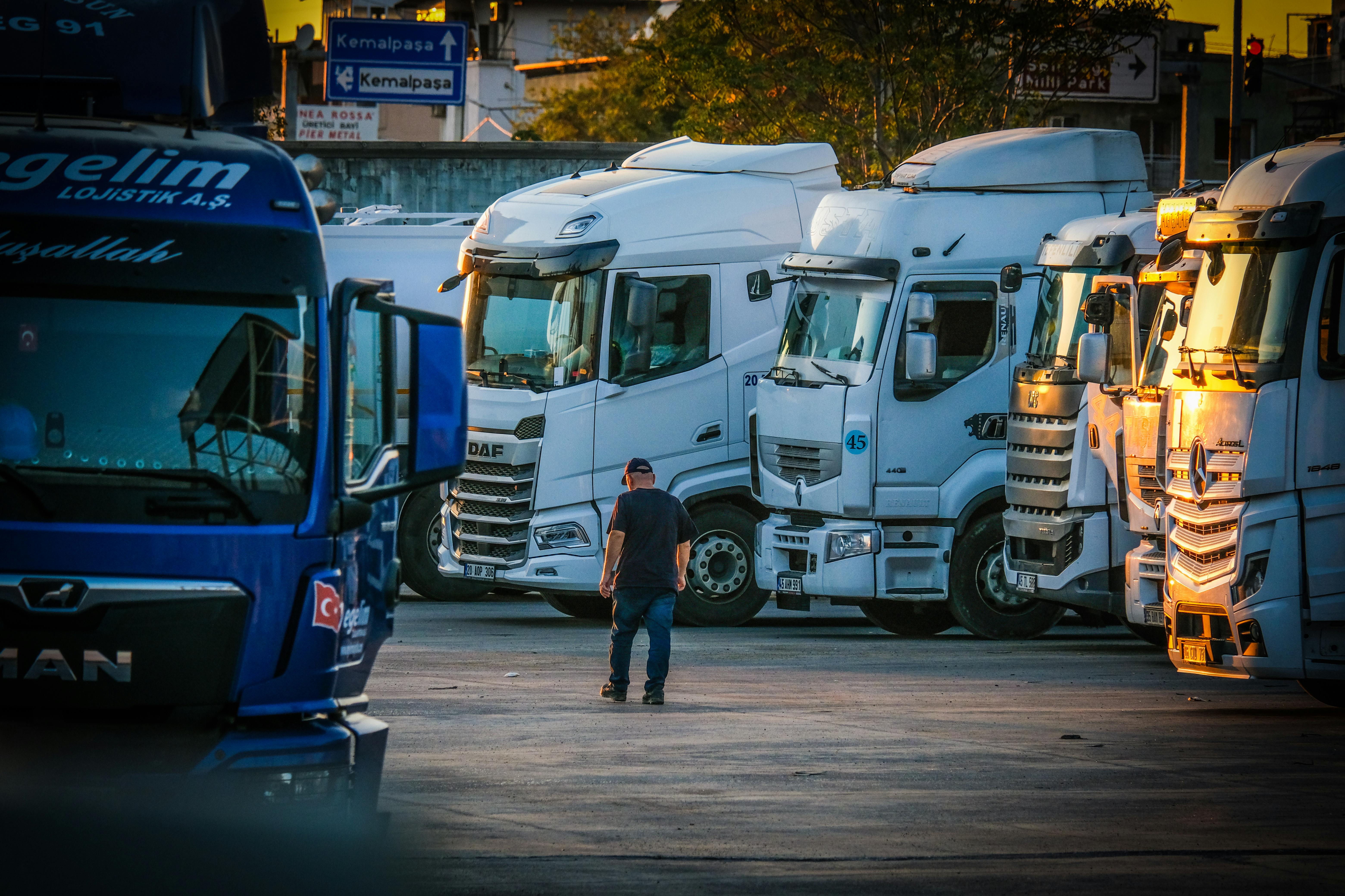 Omni Logistics fleet vehicles in an operational yard